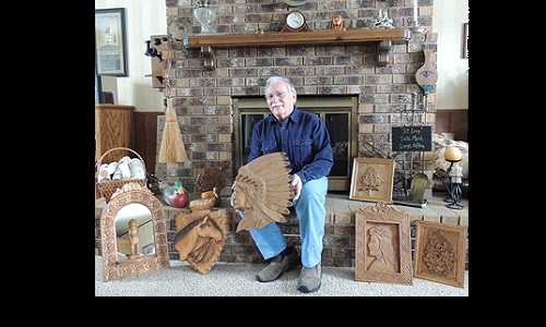 Dick Leintz and carvings-Mar 16 issue.jpg Image