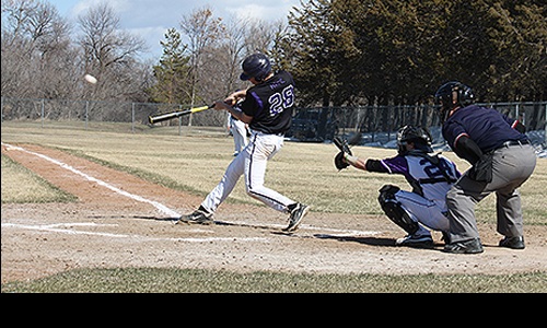 Mark Nyhus at bat-May 11, 2013 issue Image