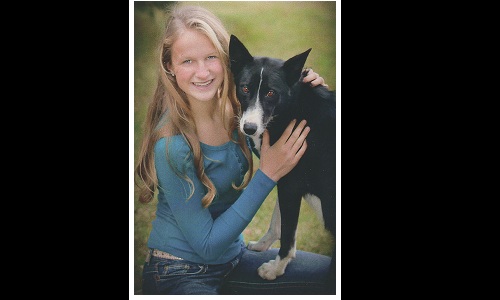 Melinda Tjelta and one of her sled dogs - Jan 12 issue Image