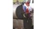 Jeff Schafer at BBQ pit Image
