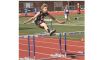 Madden runs the hurdes Image