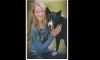 Melinda Tjelta and one of her sled dogs - Jan 12 issue Image